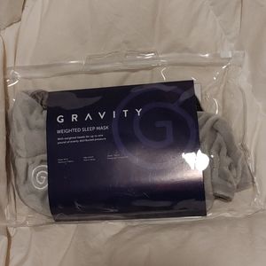 Gravity weighted sleep mask